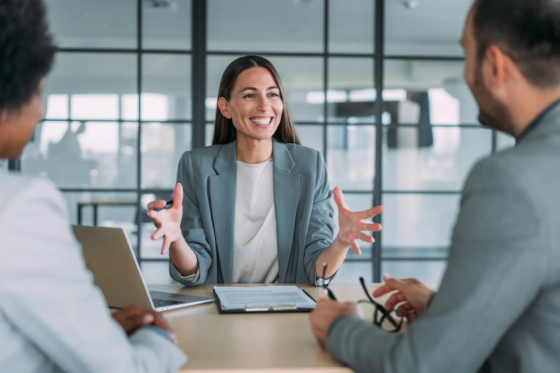 Group of business persons talking in the office