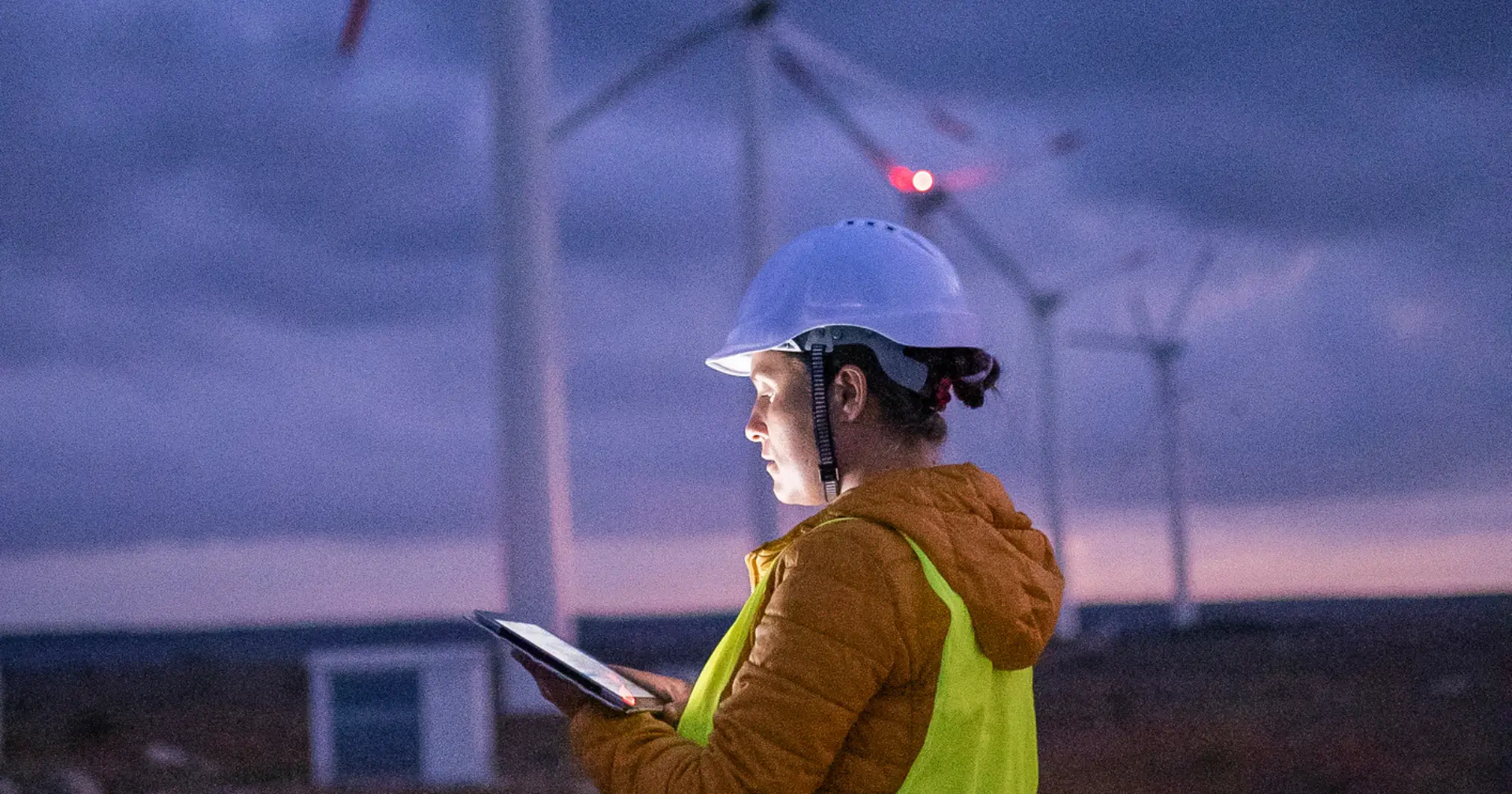 Pregnant woman engineer working on the field.